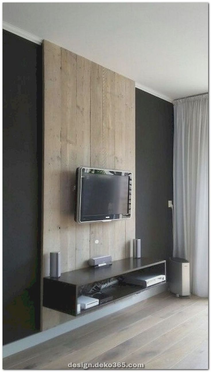 ламинат на стене в интерьере гостиной под телевизор