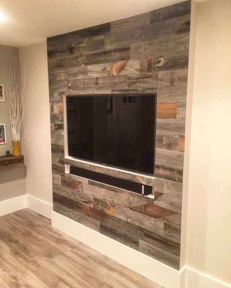 Ламинат на стене с телевизором