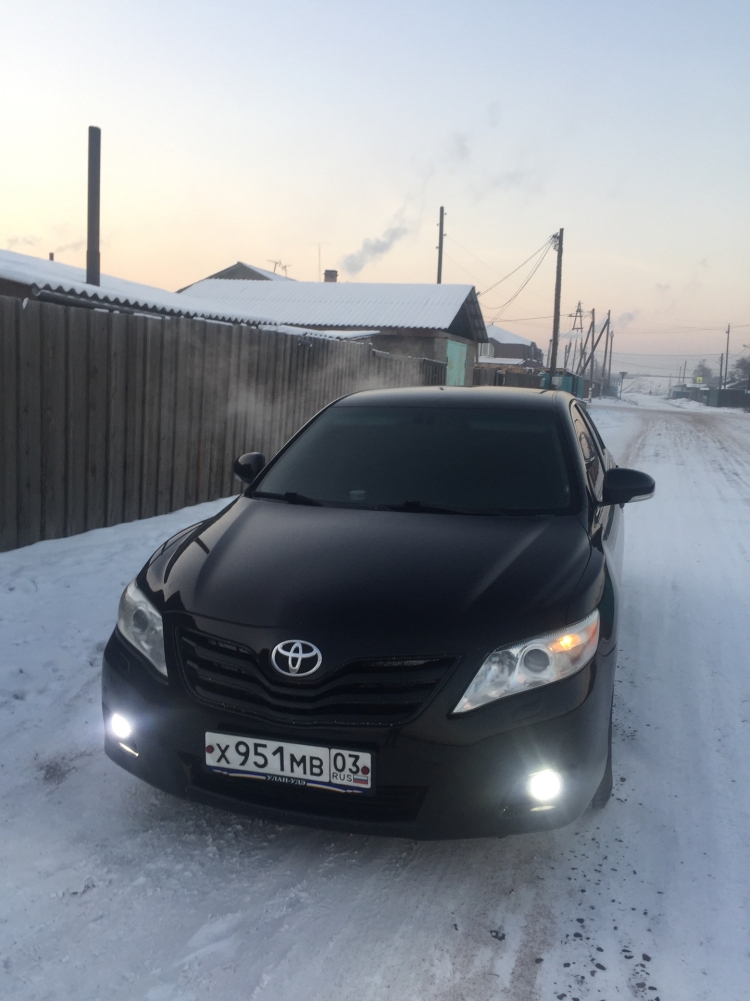 Тойота Камри 40 черная тонированная